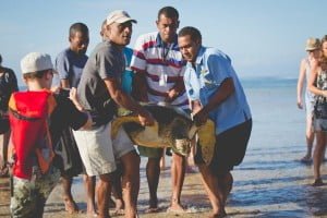 Staff at Outrigger on the Lagoon with the turtle
