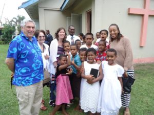 US Journalists with children from Korotogo Village