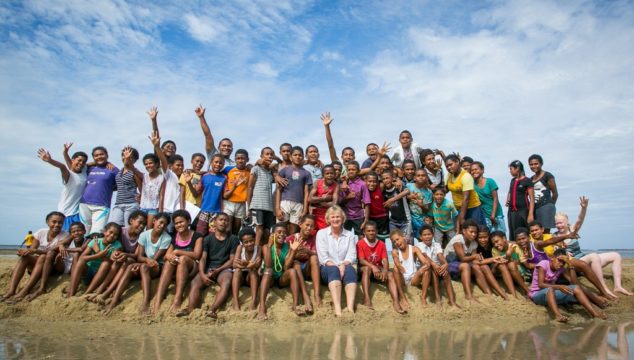 Olympic Swim Gold Medalist Shane Gould (centre) with children from Tagaqe District School