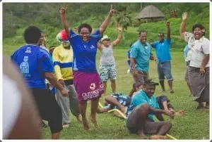 Team Rooms celebrate winning the tug of war two years in a row