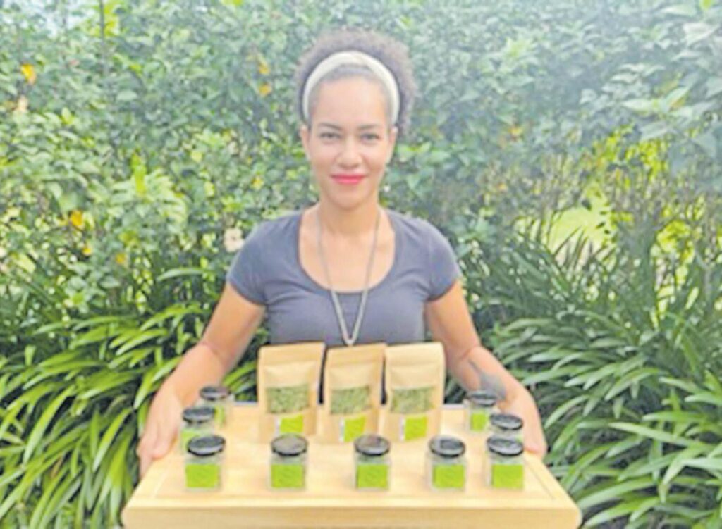 Elizabeth Cabealawa showcases her homegrown herbs product. Picture: SUPPLIED