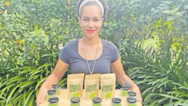 Elizabeth Cabealawa showcases her homegrown herbs product. Picture: SUPPLIED